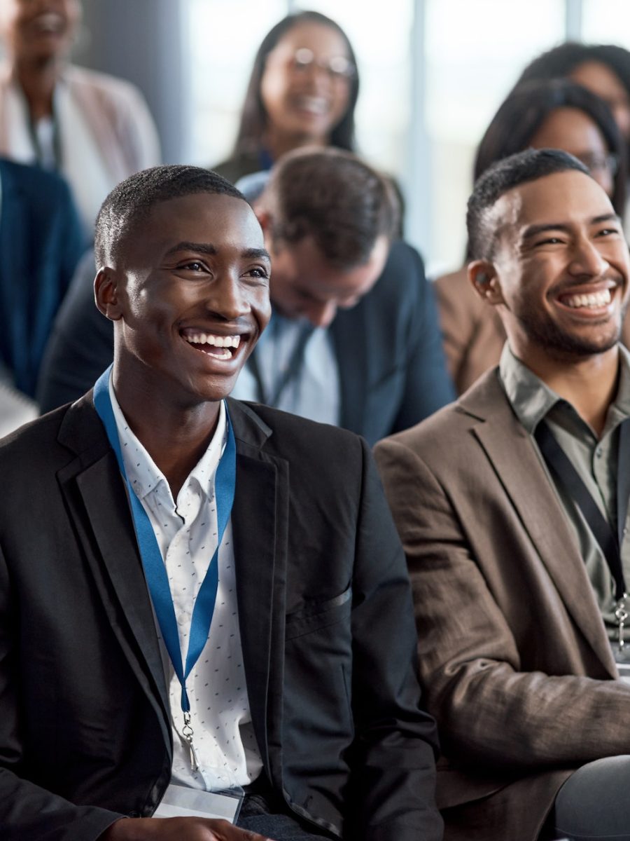 Shot of a group of businesspeople attending a conference